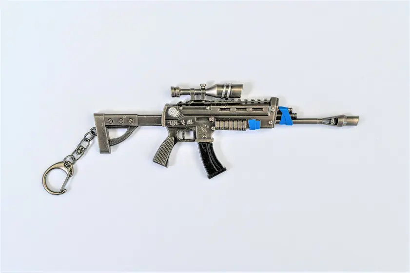 TOY RIFLE 5 comic online games keychain-0